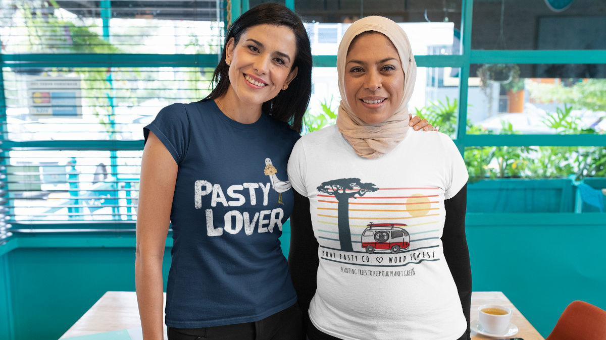 Two adult women wearing Phat Pasty tee shirts