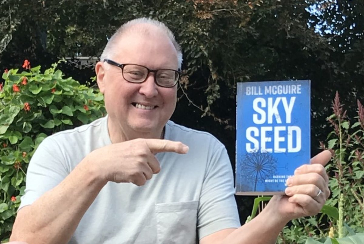 Professor Bill McGuire with his most recent book, Skyseed