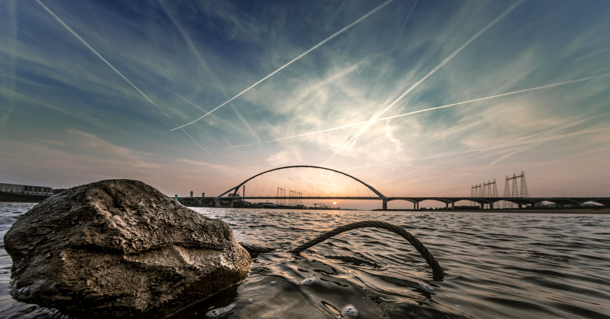 Contrails in the sky by Tijs van Leur on Unsplash