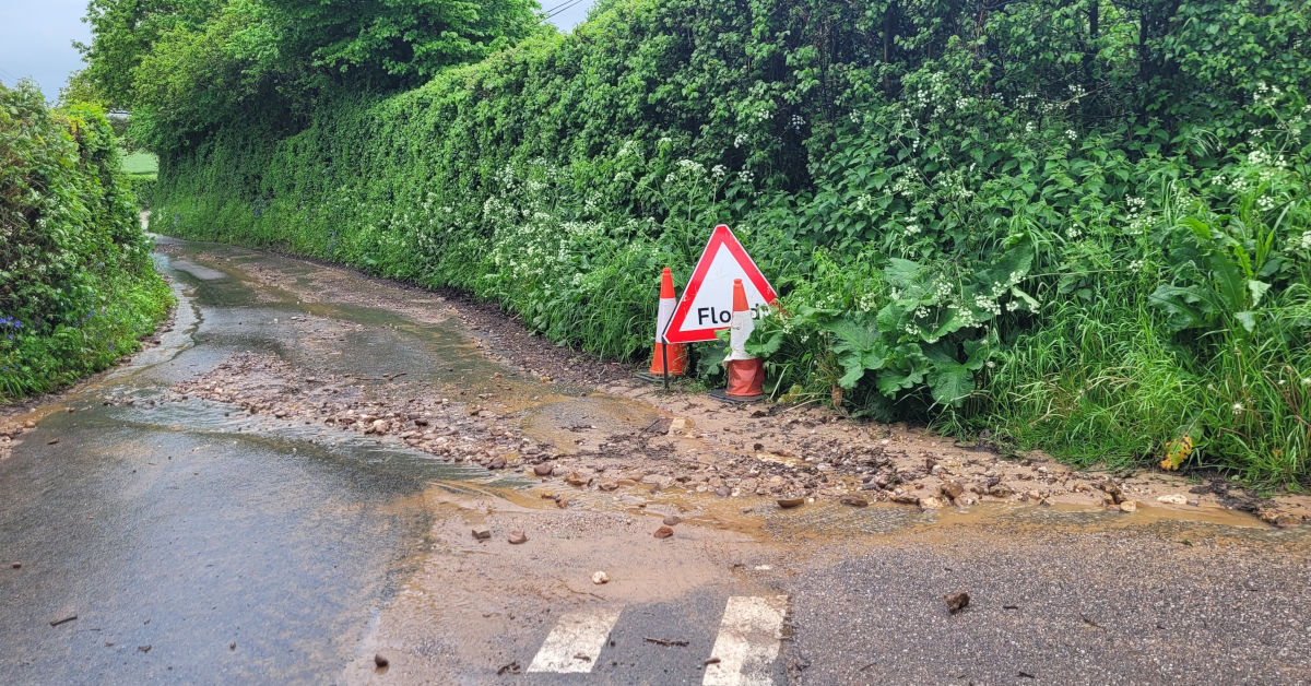 Flood warning sign in Tipton St John